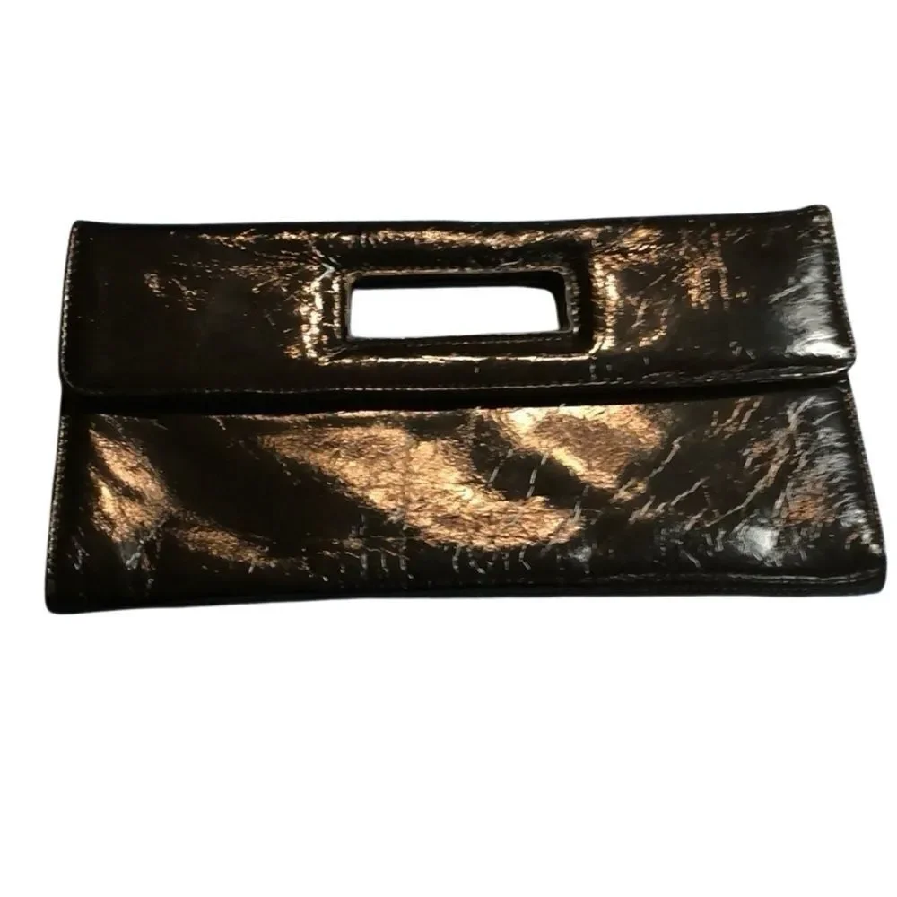 Gap black shiny clutch with zebra print inside